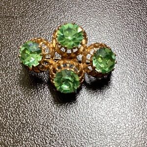 vintage made in austria green rhinestone pin.